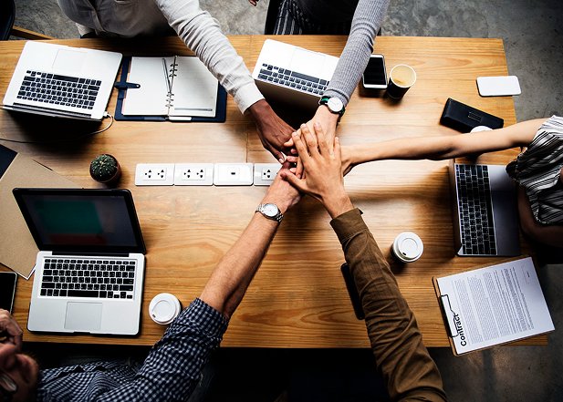 Team collaborating around a table